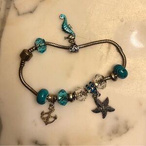 Silver Tone Sea Side Charm Bracelet with Blue Accents 8” length